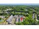 Overhead shot of the townhomes with many trees surrounding the property at 12312 Landry Renee Pl # 35, Charlotte, NC 28277