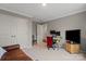 Spacious bedroom featuring a couch, large closets, and space for an office setup at 12312 Landry Renee Pl # 35, Charlotte, NC 28277