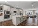 Modern kitchen featuring stainless steel appliances, a center island and an open floor plan at 12312 Landry Renee Pl # 35, Charlotte, NC 28277