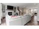 Open concept living area with a fireplace, built-in shelves and a comfortable seating arrangement at 12312 Landry Renee Pl # 35, Charlotte, NC 28277