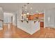 Kitchen with granite countertops, stainless steel appliances, and breakfast bar at 12724 Hunting Birds Ln, Charlotte, NC 28278