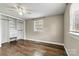 Bedroom featuring hardwood floors, a closet with built in shelves, and natural light at 1407 17Th Ne Ave, Hickory, NC 28601