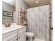 A cozy bathroom features neutral decor and standard bathroom fixtures at 1708 Royal Gorge Ave, Charlotte, NC 28210