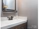 Modern bathroom with stylish fixtures, a vanity with storage, and a clean, minimalist design at 1708 Royal Gorge Ave, Charlotte, NC 28210