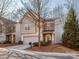 Charming two-story home featuring brick and siding, a well-manicured lawn, and an attached garage at 1708 Royal Gorge Ave, Charlotte, NC 28210