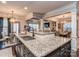 Island seating at the kitchen island provides views of the living room and the breakfast nook at 1708 Royal Gorge Ave, Charlotte, NC 28210