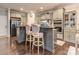 An open kitchen with granite countertops, stainless steel appliances, and stylish island seating at 1708 Royal Gorge Ave, Charlotte, NC 28210