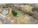Picturesque aerial shot featuring a playground and pond with a basketball court nearby at 1710 Woodward Ave, Charlotte, NC 28206