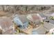 A blue house featuring a backyard with a patio, fenced yard, and outdoor seating area at 1710 Woodward Ave, Charlotte, NC 28206