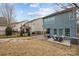 Fenced backyard with patio, deck, and well-maintained lawn at 1710 Woodward Ave, Charlotte, NC 28206