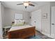 Cozy bedroom with a ceiling fan, double closets and a comfortable setting at 1710 Woodward Ave, Charlotte, NC 28206
