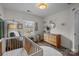 Bright Bedroom with a crib, dresser, and decor at 1710 Woodward Ave, Charlotte, NC 28206
