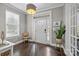 Elegant foyer with hardwood floors and an abundance of natural light at 1710 Woodward Ave, Charlotte, NC 28206
