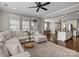 Living room boasts open-concept design and lots of windows, offering both style and lots of natural light at 1710 Woodward Ave, Charlotte, NC 28206
