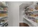 Walk-in pantry with abundant white wire shelving, providing ample storage for all your pantry needs at 1710 Woodward Ave, Charlotte, NC 28206
