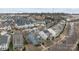 This is an aerial view of a neighborhood street with homes that have large front lawns at 1710 Woodward Ave, Charlotte, NC 28206