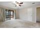 Bright bedroom with private access to an outdoor screened-in porch at 1715 Shagbark Ln, Charlotte, NC 28226