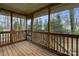 Enjoy the outdoors from this screened-in porch, perfect for relaxing or entertaining at 1715 Shagbark Ln, Charlotte, NC 28226