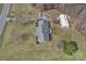 Overhead shot displaying home's layout, detached garage, landscaping and lengthy driveway at 218 Countryside Rd, Kings Mountain, NC 28086