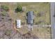 Birds-eye view of the property with a detached garage, long driveway, and surrounding greenery at 218 Countryside Rd, Kings Mountain, NC 28086