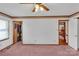 Bedroom highlighting light pink carpet, closet, and neutral wall color with decorative border at 218 Countryside Rd, Kings Mountain, NC 28086