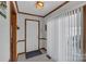 Inviting entryway with a white front door and a convenient closet for storage at 218 Countryside Rd, Kings Mountain, NC 28086