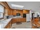 Well-lit kitchen featuring wooden cabinets, modern appliances, and a skylight that brightens the space at 218 Countryside Rd, Kings Mountain, NC 28086