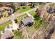 Bird's-eye of property showing a well-manicured yard, screen porch, and tree-lined perimeter at 233 Catawba Crest Ln, Clover, SC 29710