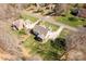 Aerial view of a home with a spacious yard, driveway, and proximity to surrounding homes at 233 Catawba Crest Ln, Clover, SC 29710
