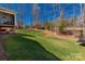 Expansive backyard with mature trees and lush lawn, partially shaded and ideal for recreation at 233 Catawba Crest Ln, Clover, SC 29710