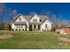 Charming home with a well-manicured lawn and inviting curb appeal on a sunny day at 233 Catawba Crest Ln, Clover, SC 29710