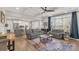 Bright living room with neutral tones, hardwood floors, and large windows for natural light at 233 Catawba Crest Ln, Clover, SC 29710