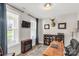 Comfortable office with decorative fireplace, natural wood desk and plenty of natural light at 233 Catawba Crest Ln, Clover, SC 29710