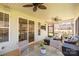 Inviting screened porch featuring ceiling fans, comfortable seating, and a view of the outdoors at 233 Catawba Crest Ln, Clover, SC 29710