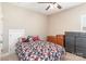 Bedroom features neutral decor with a bed, dresser, and windows at 3002 Paddington Dr, Indian Trail, NC 28079