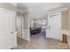 Elegant dining room featuring hardwood floors, crown molding, and a stylish chandelier at 3002 Paddington Dr, Indian Trail, NC 28079