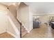 Inviting home foyer with hardwood floors and a staircase leading to the upper level at 3002 Paddington Dr, Indian Trail, NC 28079