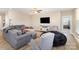Cozy living room with comfortable seating, a large TV, and an inviting atmosphere at 3002 Paddington Dr, Indian Trail, NC 28079