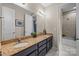 Bathroom features a dual sink vanity, granite countertops, and framed mirrors with great lighting at 3549 Sandy E Trl, Fort Mill, SC 29707