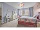Charming bedroom with a unicorn theme, soft lighting, carpet flooring, and ample natural light at 3549 Sandy E Trl, Fort Mill, SC 29707