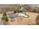 Community pool area showing the pool, parking lot, playground, gazebo and surrounding trees at 3549 Sandy E Trl, Fort Mill, SC 29707