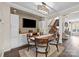Cozy dining room with modern light fixture, with easy access to the living room and kitchen at 3549 Sandy E Trl, Fort Mill, SC 29707