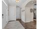 Inviting entryway featuring wood floors, modern lighting and a welcoming atmosphere at 3549 Sandy E Trl, Fort Mill, SC 29707