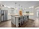 Bright, spacious kitchen featuring an island, stainless steel appliances and gray cabinets at 3549 Sandy E Trl, Fort Mill, SC 29707