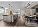 Spacious kitchen and dining room featuring a large island with seating at 3549 Sandy E Trl, Fort Mill, SC 29707