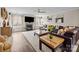 Bright living room with ample seating, decorative fireplace, and stylish decor at 3549 Sandy E Trl, Fort Mill, SC 29707