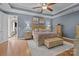 Spacious main bedroom featuring wood floors and neutral color palette at 3549 Sandy E Trl, Fort Mill, SC 29707