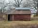 Rustic barn featuring weathered wood and a classic design, perfect for storage or hobby space at 3708 Secrest Shortcut Rd, Monroe, NC 28110