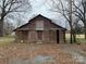 Barn featuring a classic design with large doors, providing ample storage or workspace at 3708 Secrest Shortcut Rd, Monroe, NC 28110