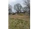 Sprawling lot with a residence nestled on it and lush foliage, providing privacy and a serene ambiance at 3708 Secrest Shortcut Rd, Monroe, NC 28110